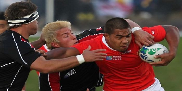 Sione Vaiomo'unga carries the ball for Tonga during pool game with Canada in the 2011 Rugby World Cup in New Zealand