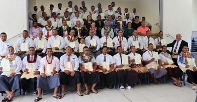 Australia&#039;s Deputy High Commissioner Ms Rhona McPhee and the 82 trainees who received certificates in carpentry